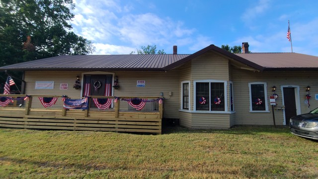 THE FRONT OF OUR HISTORICAL DEPOT PATRIOTICALLY DECORATED.