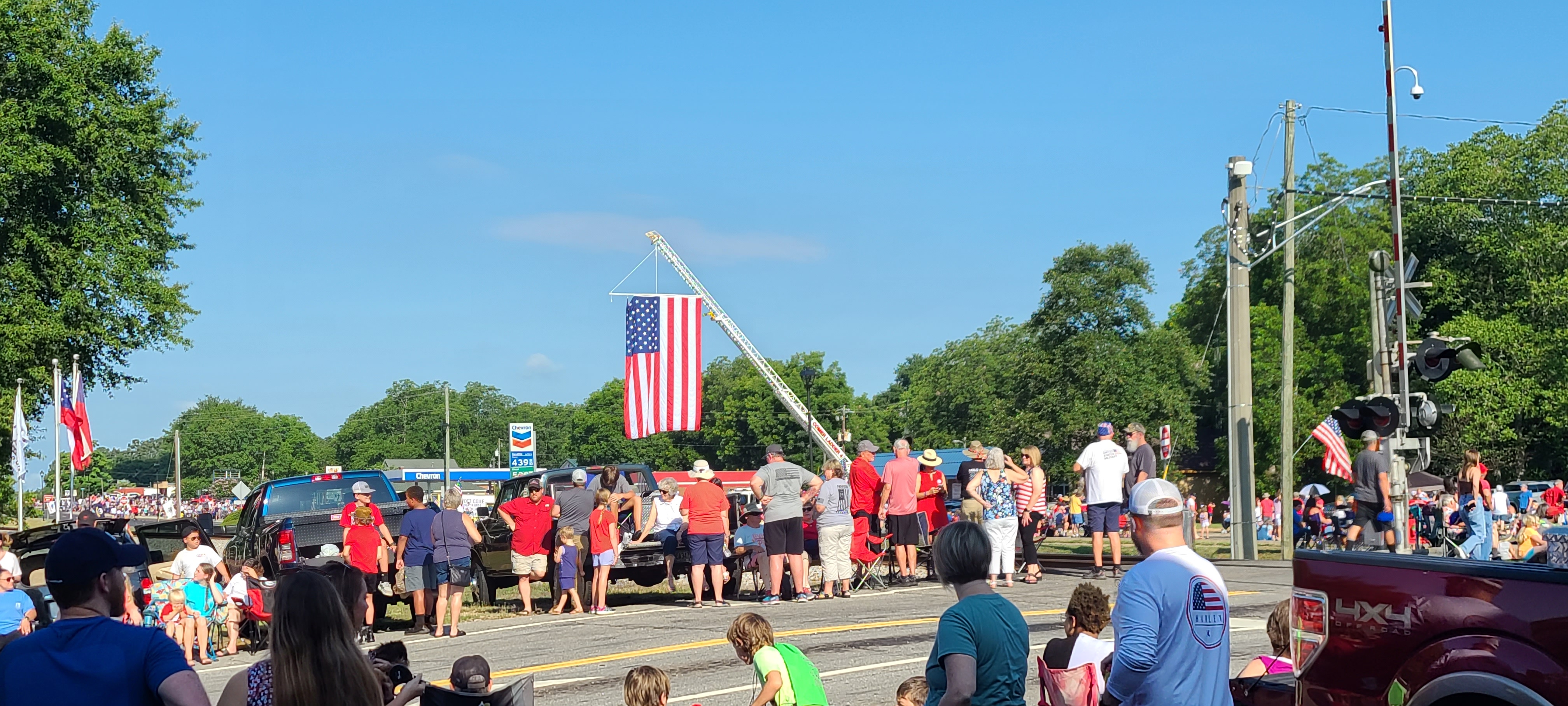 PROUD DISPLAY OF OUR AMERICAN FLAG MADE POSSIBLE BY A LOCAL VOLUNTEER FIRE DEPARTMENT.